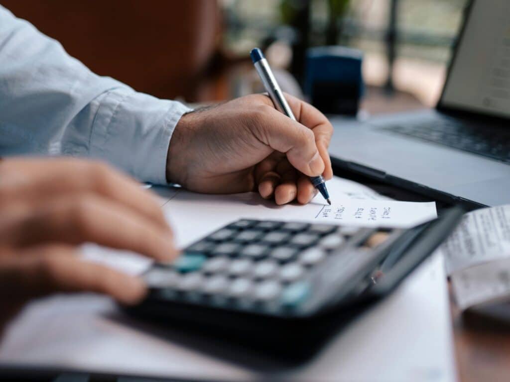 person using calculator