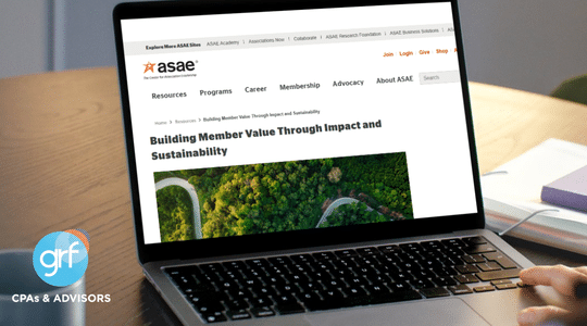 GRF's Melissa Musser's article "Building Member Value Through Impact and Sustainability" on a laptop